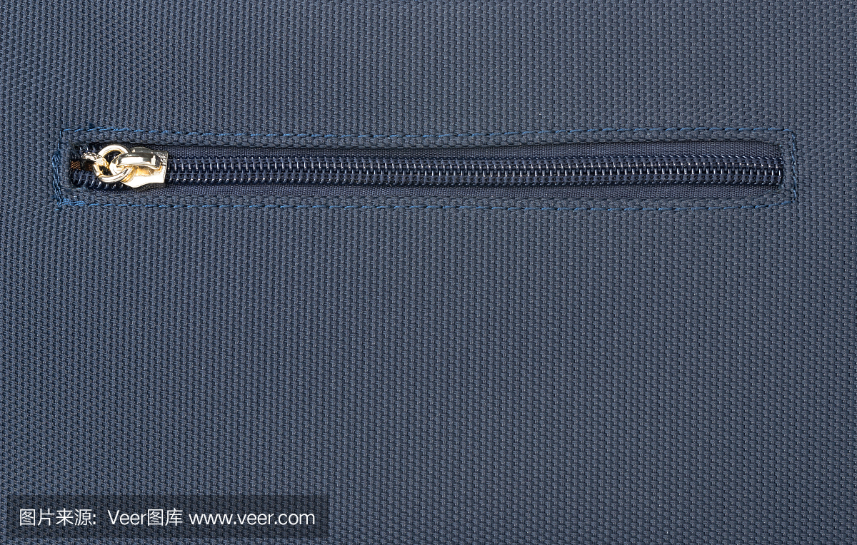 近距離拉鏈上的藍(lán)色牛仔布背景