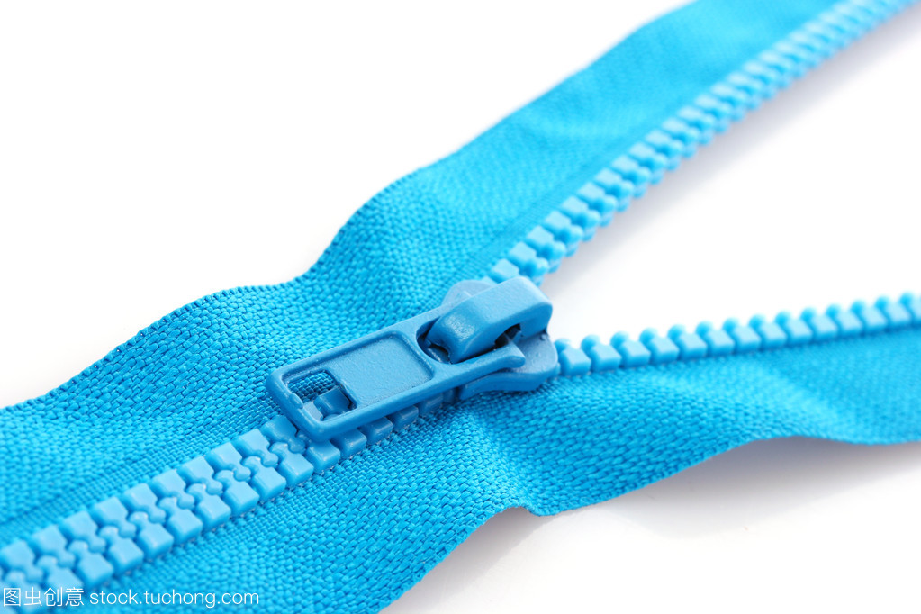 孤立在白色的藍色拉鏈特寫